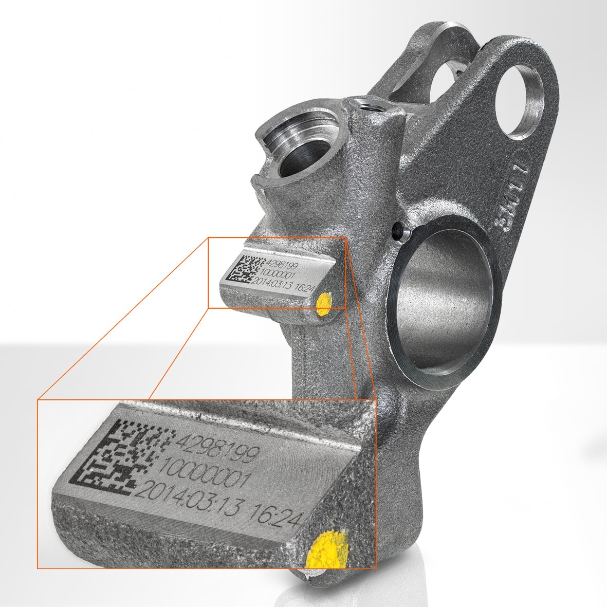 The rocker arm for a Jacobs Vehicle Systems engine brake is marked with a traceability code.
